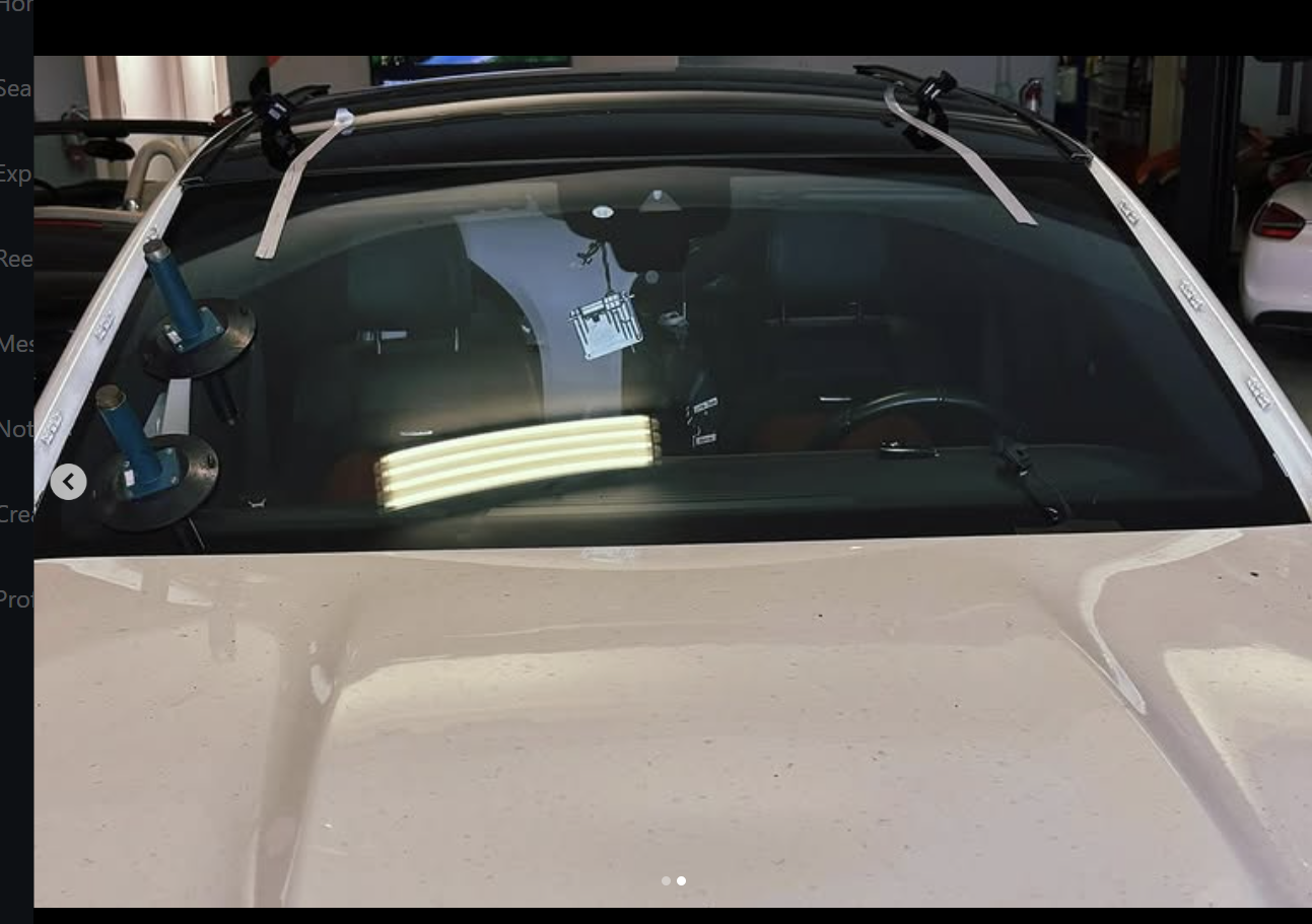 Windshield installation in progress